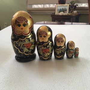 Five piece nesting doll set marked five M